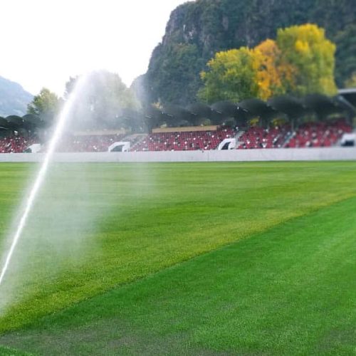 A turf football pitch undergoing drainage and subgrade work