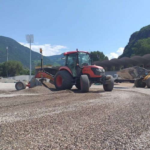 A turf football pitch undergoing drainage and subgrade work